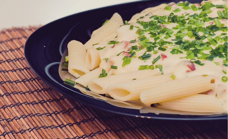 Penne pasta with creamy alfredo sauce